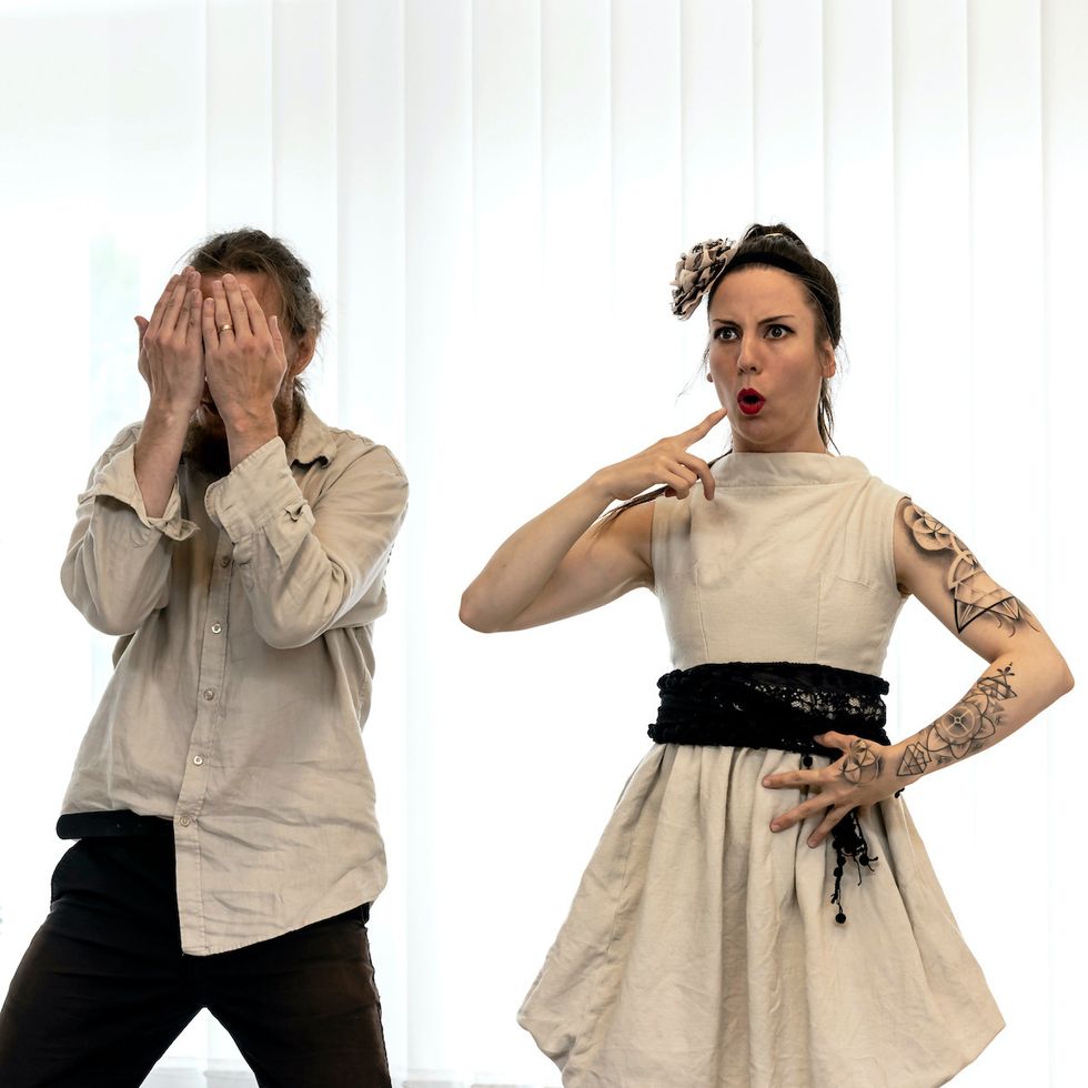 Tomaš covering his face with his hands, next to him Eliška is having an ahaa moment
